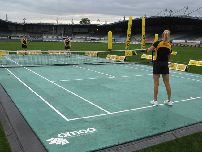 AMCO Sports Mat on a tennis court