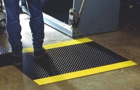 Guy standing on a safety mat