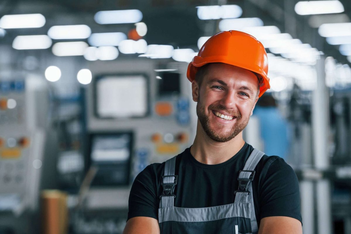 Smiling employee at his workplace