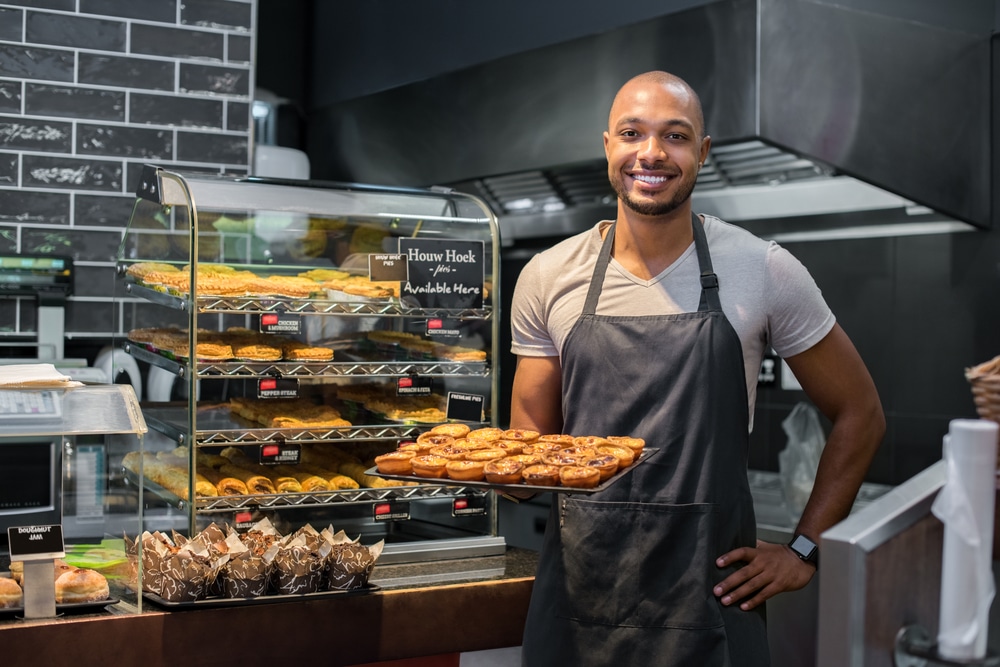 Man holding Pastries