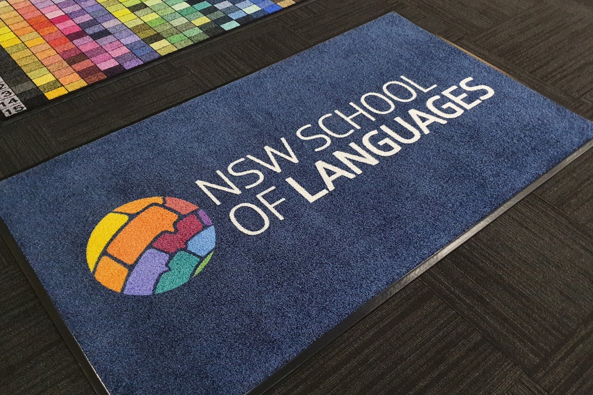 AMCO custom logo entry mat for the NSW School of Languages