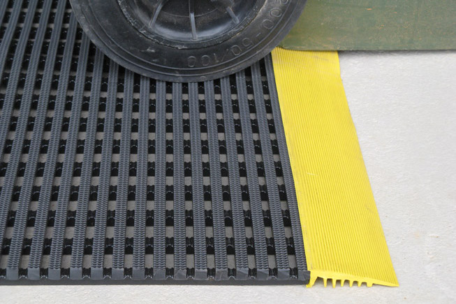AMCO StrongGrip anti-slip mat close up with a wheel