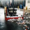 AMCO Sweepex Broom sweeping up warehouse rubbish